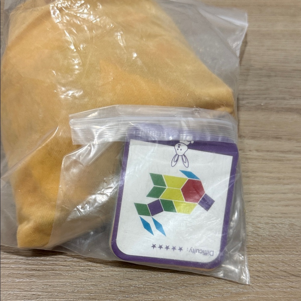 Mustard Yellow Knit Top with Colorful Logo Tag